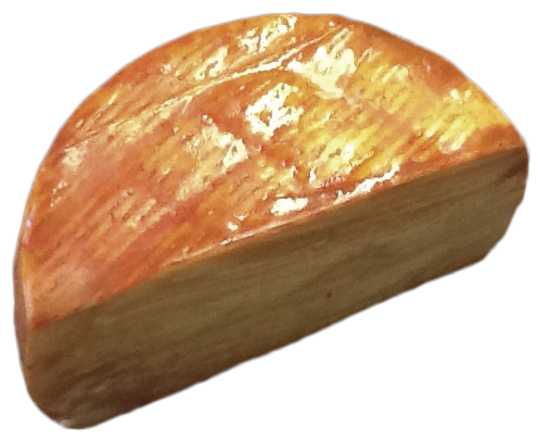 Corte de queso artesano de cabra de pasta blanda ahumado