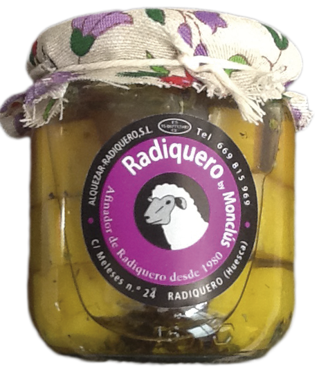 Tarro de queso de cabra artesano Radiquero conservado en aceite de oliva virgen extra.